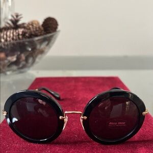 Miu miu black round sunglasses metal gold tone temple